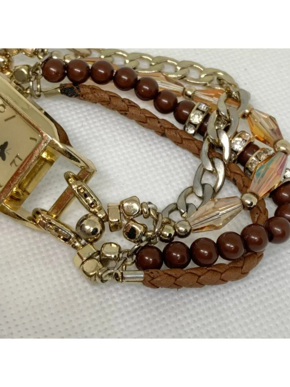 Women’s butterfly gold tone watch 22mm quartz analog beaded bracelet 7” running